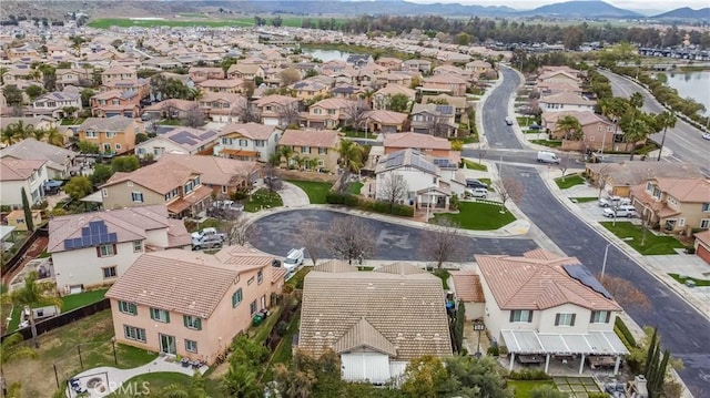 aerial view with a mountain view and a residential view