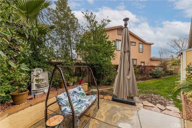 view of patio with fence