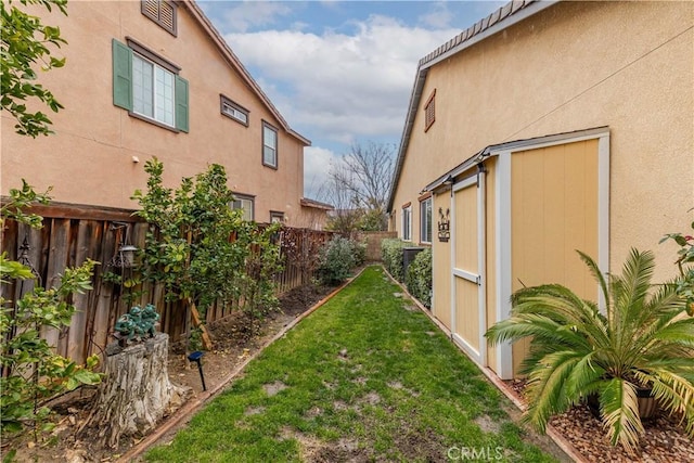 view of yard with a fenced backyard