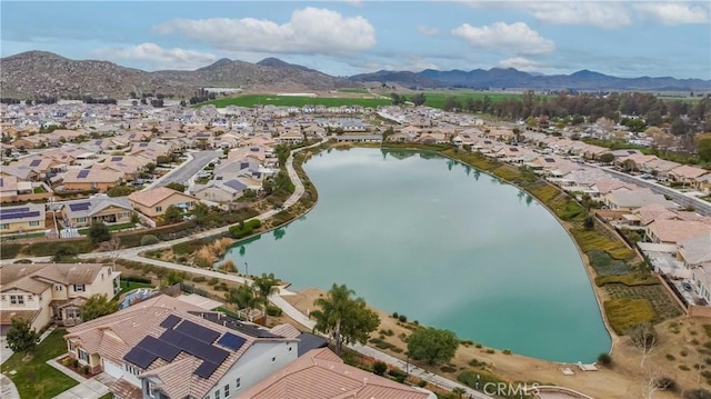 bird's eye view featuring a residential view and a water and mountain view