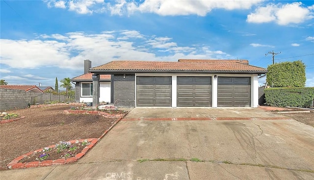 garage with fence