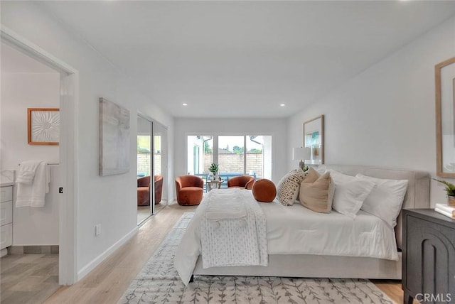 bedroom with light wood-style flooring, recessed lighting, and baseboards