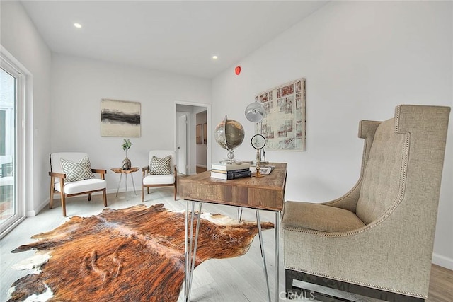 office space featuring recessed lighting, baseboards, and wood finished floors