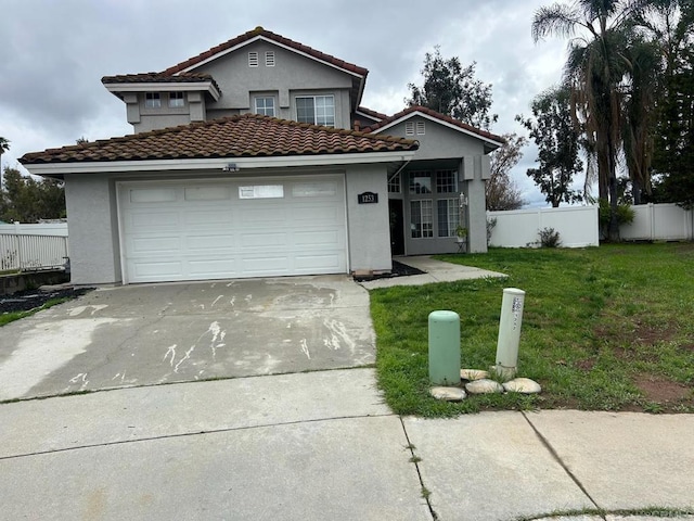 view of front facade featuring stucco siding, driveway, fence, a front yard, and a garage