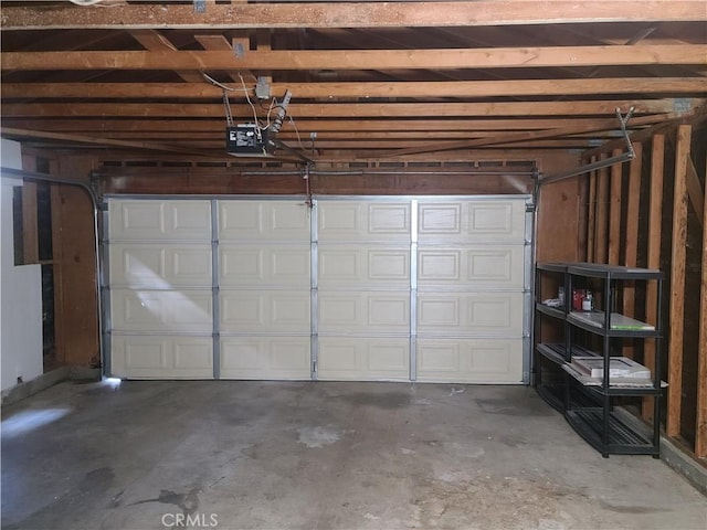 garage featuring a garage door opener