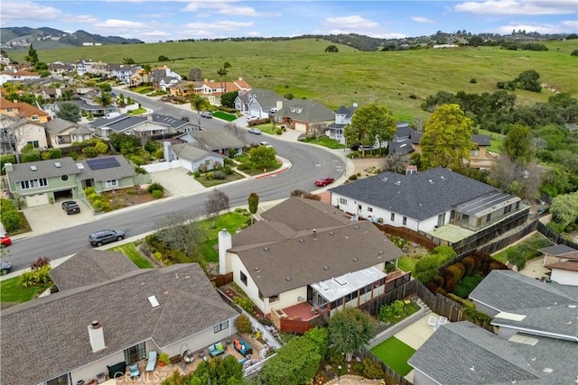 birds eye view of property with a residential view