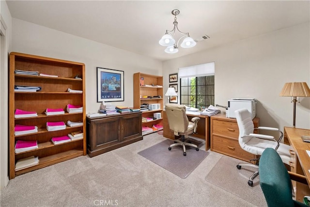 office area featuring visible vents, carpet floors, and an inviting chandelier