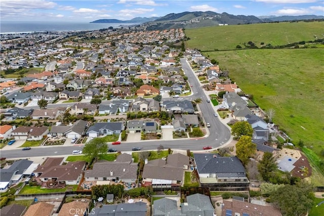 bird's eye view with a mountain view and a residential view