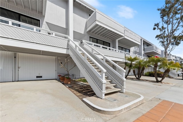 view of property featuring stairs