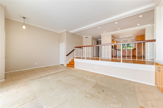 tiled spare room featuring baseboards, stairs, carpet, and ornamental molding