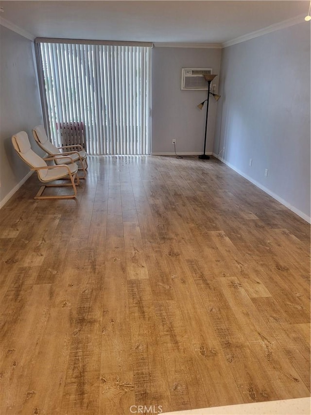 4545 Collwood Blvd Unit 19, San Diego, CA 92115 - unfurnished room featuring wood finished floors, crown molding, and an AC wall unit