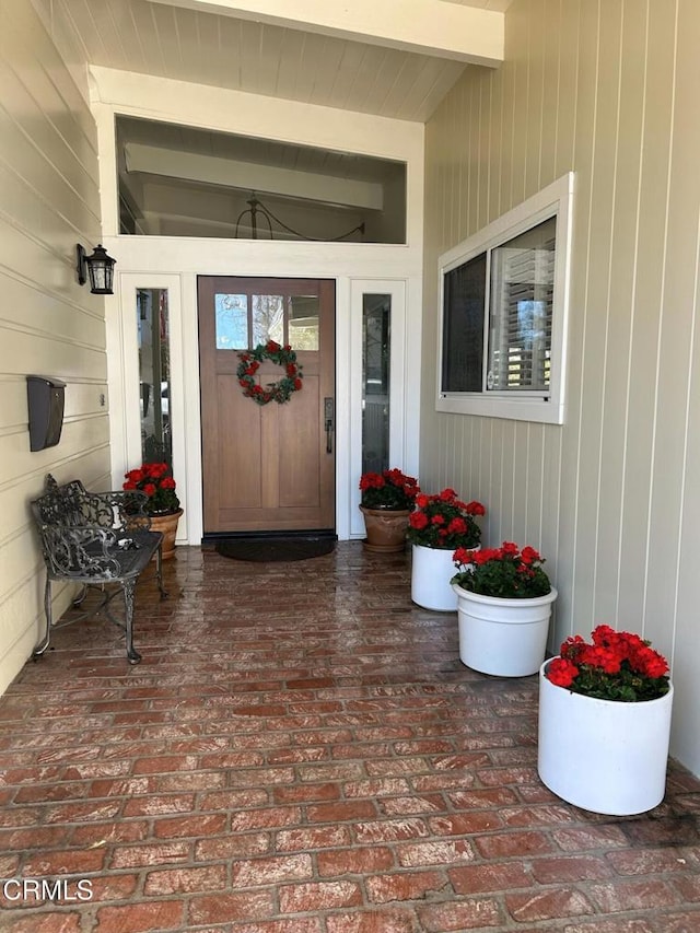 entrance to property with covered porch