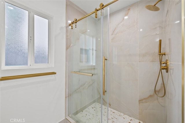 full bathroom featuring a marble finish shower