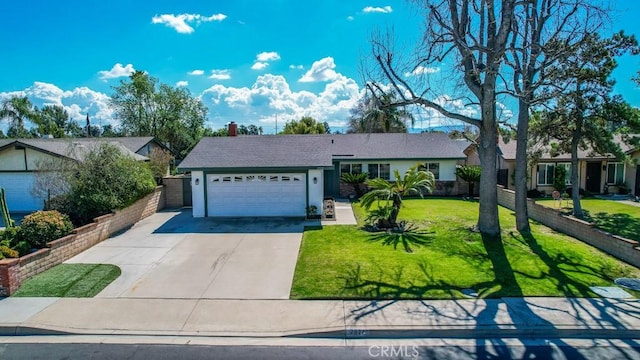 single story home featuring an attached garage, driveway, a front lawn, and fence