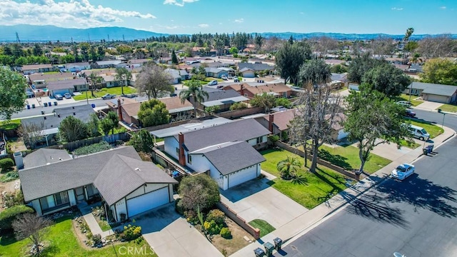 drone / aerial view with a mountain view and a residential view