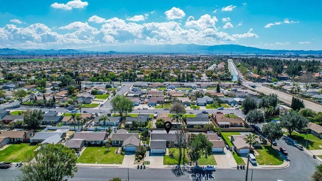 bird's eye view with a mountain view and a residential view