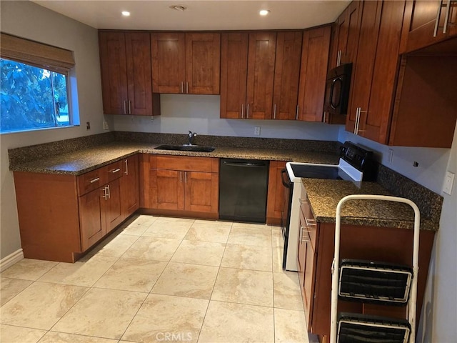 kitchen featuring light tile patterned floors, recessed lighting, a sink, black appliances, and dark countertops