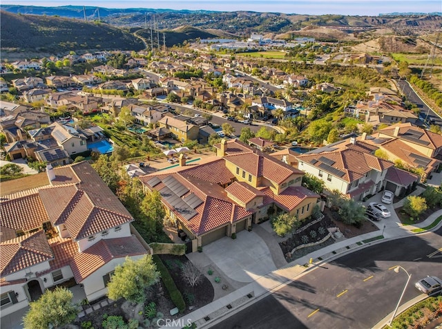 birds eye view of property with a residential view