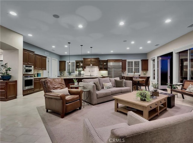 living area featuring recessed lighting