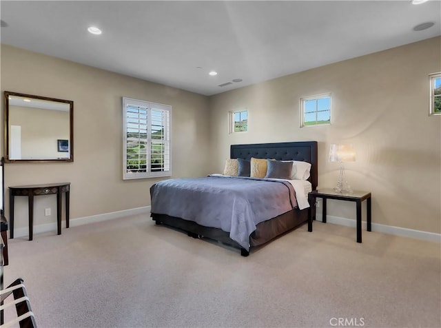 bedroom featuring visible vents, baseboards, and carpet floors