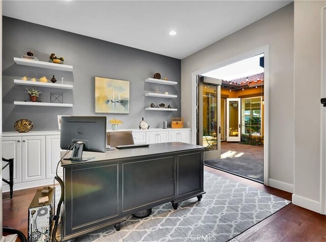 home office featuring recessed lighting, baseboards, and wood finished floors
