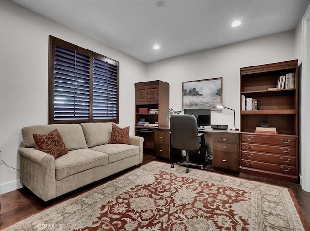 home office with dark wood finished floors, recessed lighting, and baseboards