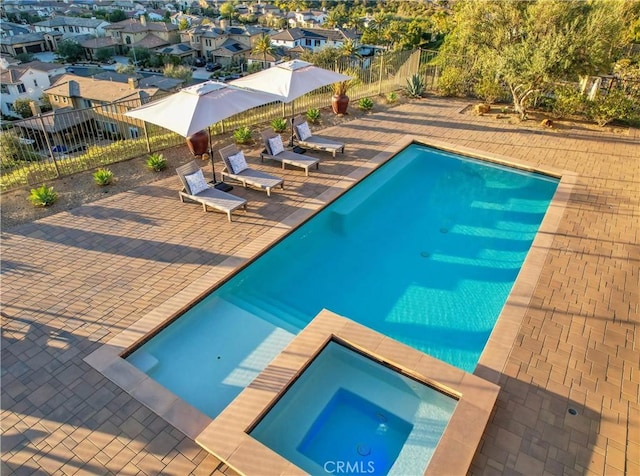 31801 Via Granada, San Juan Capistrano, CA 92675 - view of pool with a patio, a fenced backyard, and a pool with connected hot tub