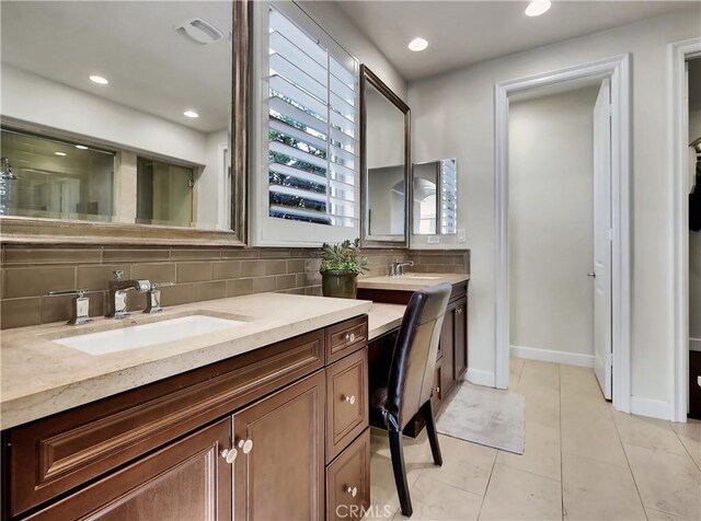 full bath featuring tile patterned flooring, vanity, recessed lighting, baseboards, and tasteful backsplash