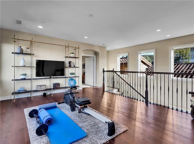 31801 Via Granada, San Juan Capistrano, CA 92675 - workout area with hardwood / wood-style floors, recessed lighting, baseboards, and arched walkways