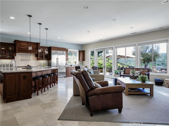 living area with recessed lighting