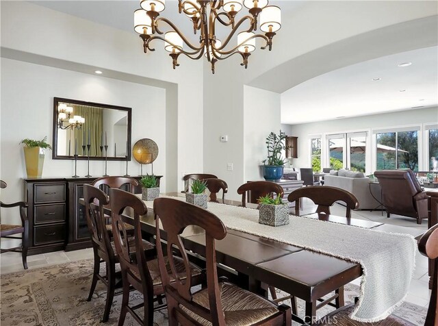 dining room featuring recessed lighting, a chandelier, and light tile patterned floors