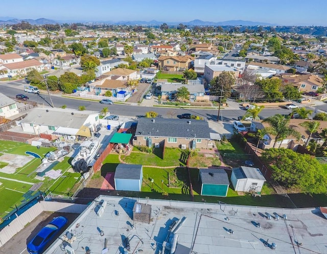 bird's eye view with a mountain view and a residential view