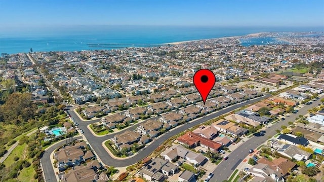 aerial view with a residential view and a water view