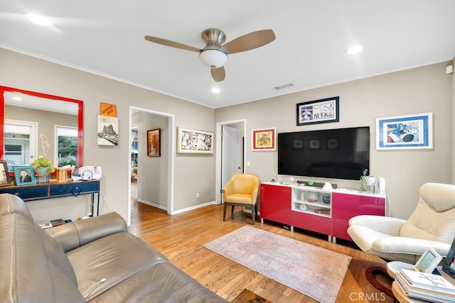 living room featuring visible vents, a ceiling fan, wood finished floors, recessed lighting, and baseboards