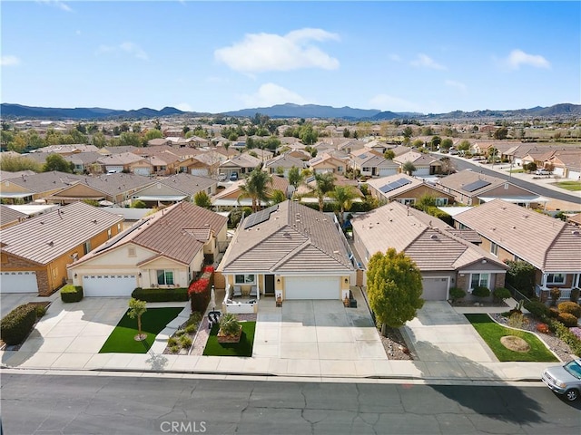 bird's eye view featuring a residential view and a mountain view