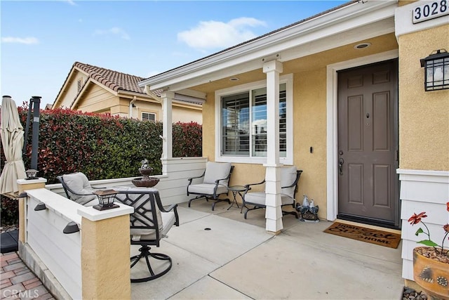 view of patio featuring covered porch