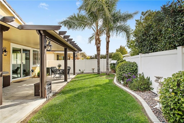 view of yard featuring a patio and a fenced backyard