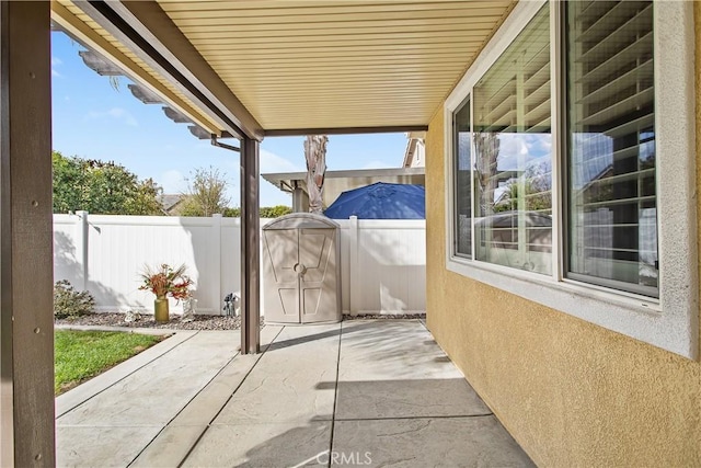 view of patio with fence