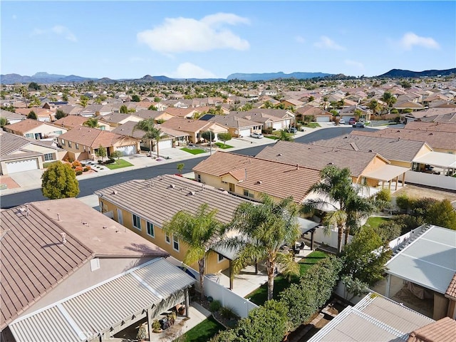 aerial view featuring a mountain view and a residential view