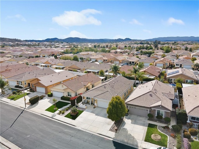 bird's eye view with a mountain view and a residential view