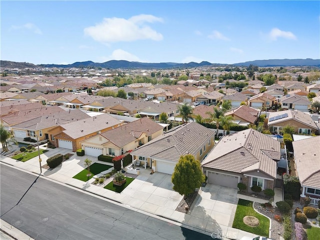 bird's eye view with a mountain view and a residential view