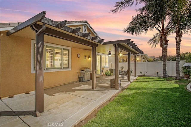 30283 Moon Star Cir, Menifee, CA 92584 - back of house with stucco siding, a patio, and a ceiling fan