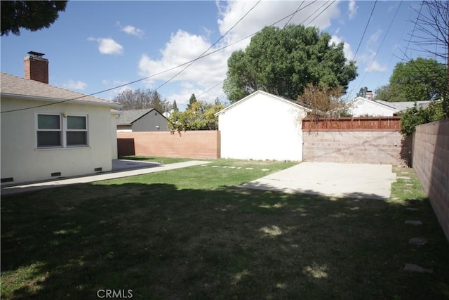 view of yard featuring a fenced backyard and a patio area