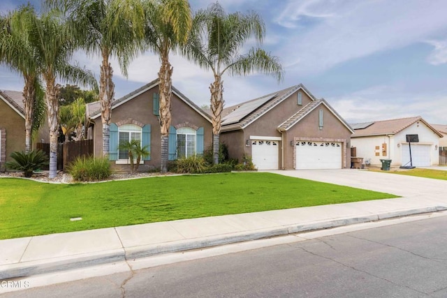 ranch-style house featuring stucco siding, fence, concrete driveway, an attached garage, and a front yard