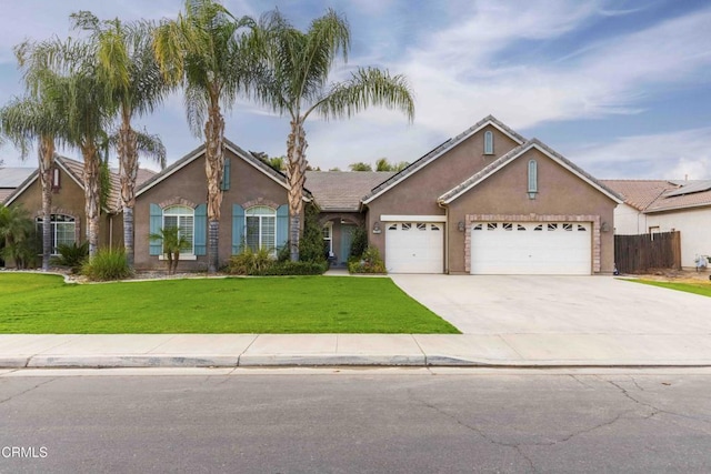 view of front of home with a garage, stucco siding, concrete driveway, and a front lawn