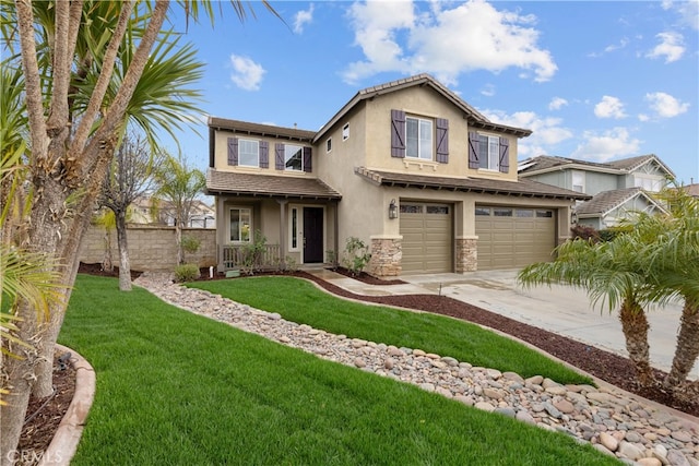 view of front of house with a front lawn, concrete driveway, stucco siding, stone siding, and an attached garage