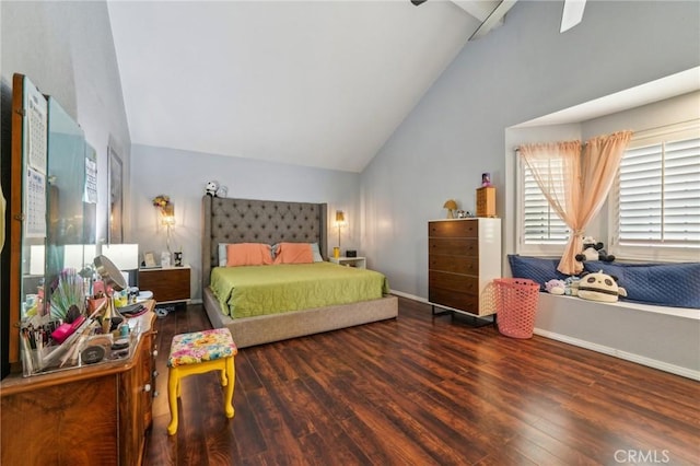 bedroom with baseboards, high vaulted ceiling, and wood finished floors