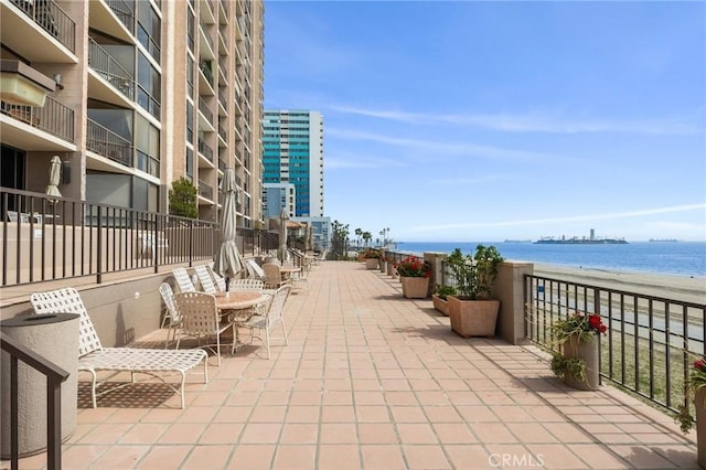 view of patio / terrace with a water view