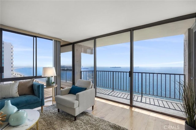 sunroom with a water view