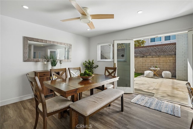 dining room with recessed lighting, a ceiling fan, baseboards, and wood finished floors